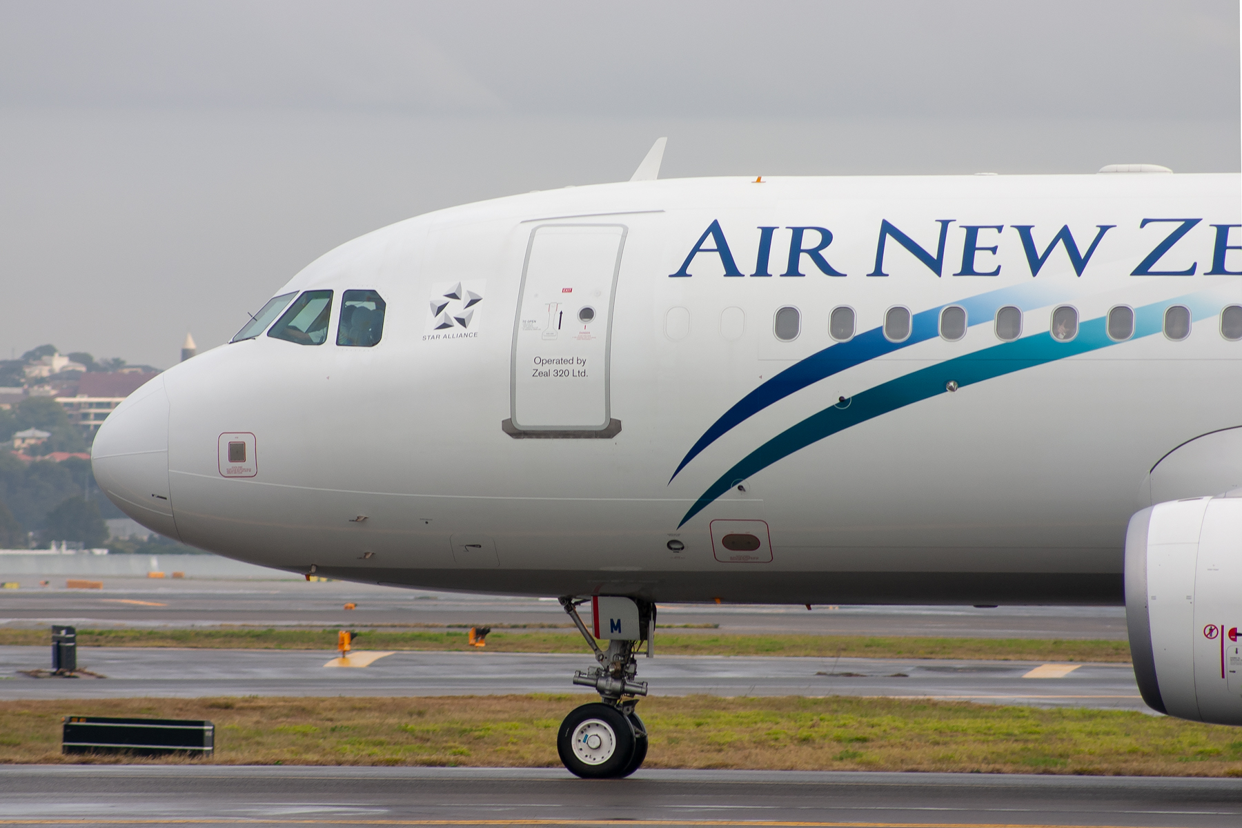 Freedom Airlines Airbus A320-200 ZK-OJM at Kingsford Smith