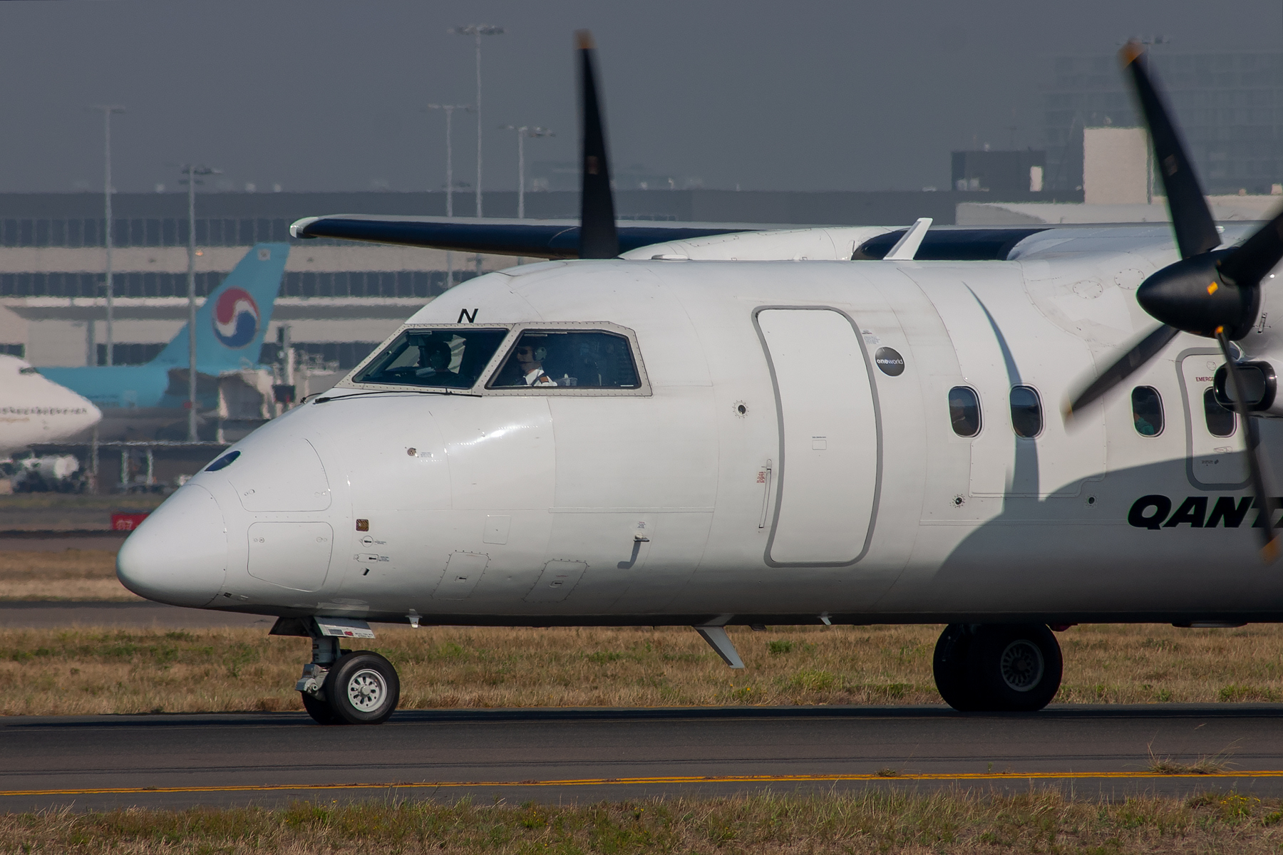 QantasLINK deHavilland Canada DHC8-100 VH-TQN at Kingsford Smith