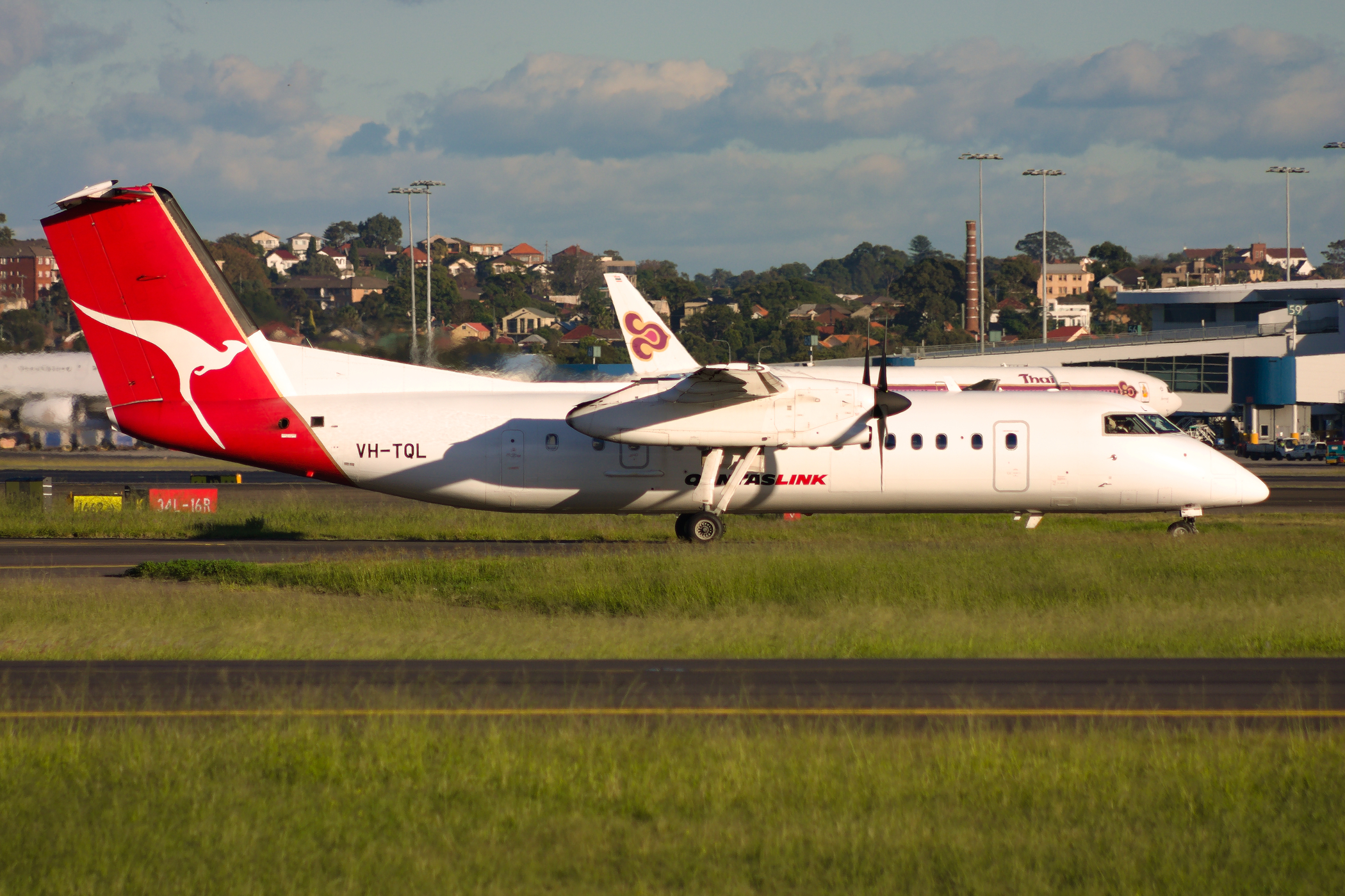 QantasLINK deHavilland Canada DHC8-300 VH-TQL at Kingsford Smith