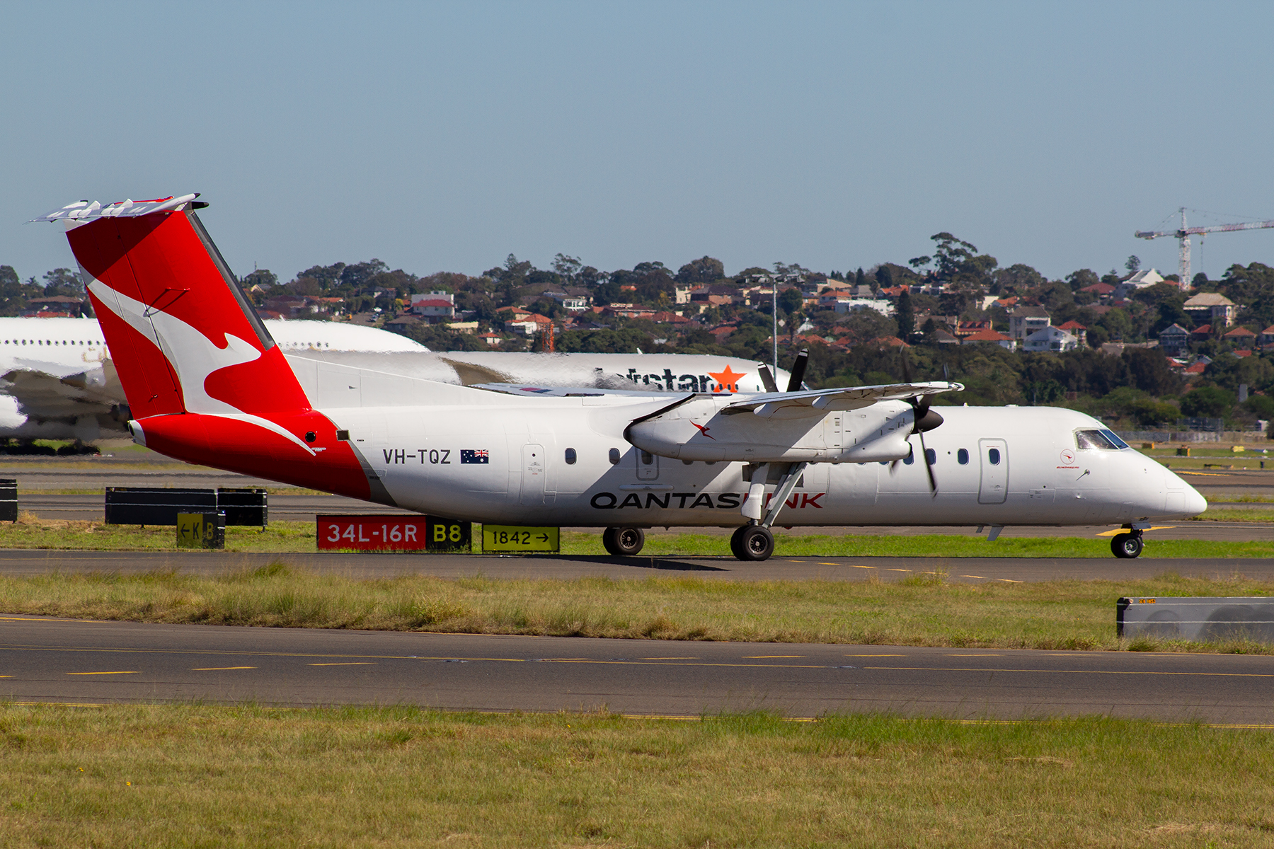 QantasLINK deHavilland Canada DHC8-300 VH-TQZ at Kingsford Smith